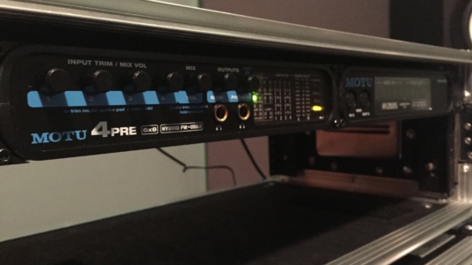 A studio rack with a MOTU 4Pre and Microlite installed